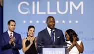 Democratic Florida gubernatorial nominee and Tallahassee Mayor Andrew Gillum concedes the race to U.S. Rep. Ron DeSantis as Gillum's running mate Chris King (L), King's wife Kristin and Gillum's wife R. Jai (R) watch at his side during his midterm electio