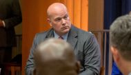 FILE PHOTO: Chief of Staff to the Attorney General Matthew Whitaker attends a roundtable discussion with foreign liaison officers at the Justice Department in Washington, U.S., August 29, 2018. REUTERS/Allison Shelley/File Photo