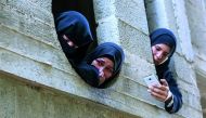 Palestinian relatives of fisherman Mustafa Abu Awda mourn during his funeral in Gaza city on November 8, 2018.  AFP / Mahmud Hams 

 