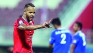 Al Duhail’s Yousef El Arabi celebrates after scoring a goal against  Al Shahania at Al Duhail Stadium yesterday. 