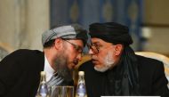 Head of Political Office of the Taliban Sher Mohammad Abbas Stanakzai (R) attends the second round of the Moscow format consultations on Afghanistan at the President Hotel in Moscow, Russia on November 09, 2018. (Sefa Karacan/Anadolu Agency)