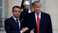 French President Emmanuel Macron welcomes U.S. President Donald Trump at the Elysee Palace on the eve of the commemoration ceremony for Armistice Day, 100 years after the end of the First World War, in Paris, France, November 10, 2018. REUTERS/Vincent Kes