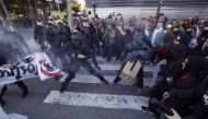 Mossos d'Esquadra police officers and protesters from Committees for the Defence of the Republic (CDR) clash during a demonstration in Barcelona, Spain, November 10, 2018. REUTERS/Albert Gea