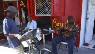A street band performs during the World Music Creole Festival on October 26, 2018 in Roseau, Dominica. AFP / Gemma Handy  