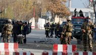 Afghan policemen inspect the site of a blast in Kabul, Afghanistan November 12, 2018. REUTERS/Omar Sobhani