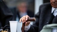 In this file photo taken on November 6, 2018 the 94-years-old defendant, a former SS guard, holds his walking stick as he has taken seat for his trial at the regional court in Muenster, western Germany. AFP / dpa / Guido Kirchner
 