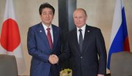 Japanese Prime Minister Shinzo Abe and Russian President Vladimir Putin attend a meeting on the sidelines of the ASEAN-Russia Summit in Singapore, November 14, 2018. Sputnik/Alexei Druzhinin/Kremlin 