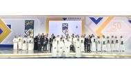 H E Sheikh Abdulla bin Saoud Al Thani  (second right), Governor of Qatar Central Bank; Abdulaziz bin Nasser Al Khalifa (right), CEO of Qatar Development Bank; and Sheikh Khalifa bin Jassim Al Thani (second left), Chairman of Qatar Chamber, with the winner