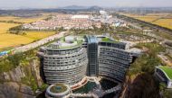 This aerial picture taken on November 13, 2018 shows the InterContinental Shanghai Wonderland, built inside a formerly abandoned quarry, about 32 kms (20 miles) southwest of Shanghai. / AFP / Johannes EISELE