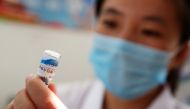 (FILES) This file picture taken on July 24, 2018 shows a nurse preparing a vaccination shot against rabies at the Disease Control and Prevention Center in Huaibei in China's eastern Anhui province. China OUT / AFP / STR