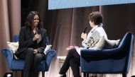 Former First Lady Michelle Obama (L) discusses her new book 