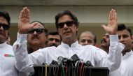 Pakistan Tehreek-e-Insaf chairman Imran Khan speaks to media after casting his vote at a polling station during the general election in Islamabad Pakistan July 25, 2018. Reuters/Athit Perawongmetha.