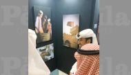 An artist during the Art and Photography Exhibition and Competition organised by College of the North Atlantic — Qatar. 