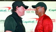 Phil Mickelson (left) and Tiger Woods (right) pose for a photo during a press conference before The Match: Tiger vs Phil golf match at Shadow Creek Golf Course. Credit: Kyle Terada-USA Today Sports 