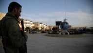 A Turkey-backed Syrian fighter stands guard on November 19, 2018 in the northwestern Syrian city of Afrin.  AFP / Bakr ALKASEM