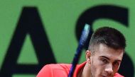 Croatian's Borna Coric plays a backhand return in his singles rubber against France's Jeremy Chardy during the Davis Cup final tennis match between France and Croatia at The Pierry-Mauroy Stadium in northern France on November 23, 2018. AFP / Denis Charle