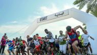 Athletes take part in the annual Olympic Day Run at Doha Corniche yesterday.