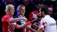 Croatia President Kolinda Grabar-Kitarovic congratulates Marin Cilic after Croatia win the Davis Cup REUTERS/Pascal Rossignol

