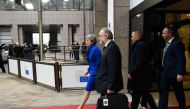 Britain's Prime Minister Theresa May leaves after a special meeting of the European Council to endorse the draft Brexit withdrawal agreement and to approve the draft political declaration on future EU-UK relations on November 25, 2018 in Brussels.  AFP / 