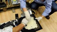 REPRESENTATIVE IMAGE: Greek authorities present confiscated guns, money and Captagon amphetamine pills after dismantling a criminal ring near Elefsina, south west of Athens, Greece, March 6, 2017. Reuters/Michalis Karagiannis