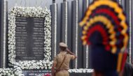 A policeman pays his respects at a memorial to mark the tenth anniversary of the November 26, 2008 attacks, in Mumbai, India, November 26, 2018. REUTERS/Francis Mascarenhas