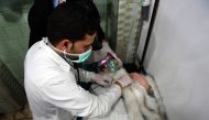 A Syrian woman receives treatment at a hospital in the regime-controlled Aleppo on November 24, 2018.  AFP / George OURFALIAN