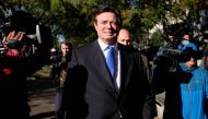 FILE PHOTO: Former Trump 2016 campaign chairman Paul Manafort leaves U.S. Federal Court after being arraigned on twelve federal charges in the investigation into alleged Russian meddling in the 2016 U.S. presidential election in Washington, U.S. October 3