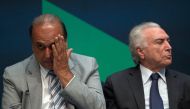 FILE PHOTO: In this file photo taken on February 20, 2018 Brazilian President Michel Temer (R) and Rio de Janeiro's Governor Luiz Fernando Pezao (L) take part in an event announcing the beginning of the final stage of the submarines construction, planned 