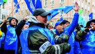 Workers and coal miners from Maritza-East, the largest coal-fired power station in Bulgaria, gesture and chant slogans during a demonstration in Sofia on November 29, 2018. Bulgaria, which gets over 40 percent of its energy from coal burning plants, will 