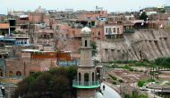 People make their way through the Old City in Kashgar, Xinjiang Uighur Autonomous Region, China September 6, 2018. Picture taken September 6, 2018. Reuters/Thomas Peter