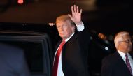 US President Donald Trump disembarks from Air Force One upon arrival in Buenos Aires, Argentina, on November 29, 2018, as he travels to attend the G20 summit.  / AFP / SAUL LOEB 
