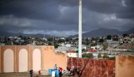 Migrants, part of a caravan of thousands from Central America trying to reach the United States, rest after moving to a new temporary shelter in Tijuana, Mexico, November 30, 2018. REUTERS/Hannah McKay