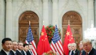 US President Donald Trump (R) and Chinese President Xi Jinping attend a working dinner after the G20 leaders summit in Buenos Aires, Argentina December 1, 2018. REUTERS/Kevin Lamarque