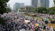 People gather at Monas Square to attend a reunion rally held by 212 Rally Alumni in Jakarta, Indonesia on December 2, 2018. ( Mahmut Atanur - Anadolu 