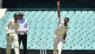 India's spin bowler Ravi Ashwin (R) bowls on the third day of the tour match against Cricket Australia XI at the SCG in Sydney on November 30, 2018. AFP / PETER PARKS