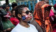 Papuans take part on a parade in Surabaya, East Java province, on December 1, 2018, during a commemoration of the independence day of Papua from Dutch colonial, which is then commemorated every year by separatists as a symbol of their freedom from Indones