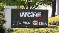 In this file photo taken on May 07, 2017, a sign sits outside the studio of Tribune Media Company's, WGN television studio in Chicago, Illinois. AFP /Getty Images North America/Scott Olson 