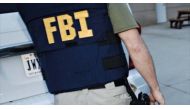 Agents in dark blue FBI windbreakers carried white cardboard boxes out of the house, which is about a mile from Atlantic City's casinos. Earlier they removed a computer and a printer, stashing the items in dark sport utility vehicles. (AFP file photo)