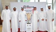 Saoud Al Mohannadi (third left), Vice President of Qatar Football Association (QFA) poses for a picture along with Hani Balan (second right), member of the QFA Executive Committee and Mansoor Al Ansari (right), Secretary General of QFA are seen along with