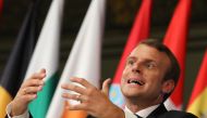 French President Emmanuel Macron gestures as he delivers a speech on the European Union in the amphitheatre of the Sorbonne University in Paris on September 26, 2017. AFP/Ludovic Marin