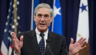 In this file photo taken on August 1, 2013, former Federal Bureau of Investigation (FBI) Director Robert Mueller speaks during a farewell ceremony in Mueller's honor at the Department of Justice. / AFP / Saul LOEB 