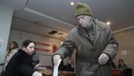 Armenian voters cast their ballot in early parliamentary election at a polling station in Yerevan, Armenia on December 09, 2018. Former Prime Minister Nikol Pashinyan resigned from his post in order for parliament to be dissolved and an early election to 