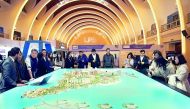 UDC representatives briefing Chinese visitors on various offerings at The Pearl-Qatar and Gewan Islands. 