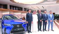 Officials pose for a group picture at the launch ceremony of the all-new Lexus UX in the Middle East.