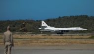 A Russian Tupolev Tu-160 strategic long-range heavy supersonic bomber aircraft lands at Maiquetia International Airport, just north of Caracas, on December 10, 2018. AFP / Federico PARRA