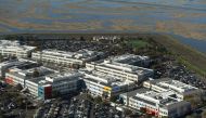 FILE PHOTO: Facebook's campus is seen on the edge of the San Francisco Bay in Menlo Park, California in this aerial photo taken January 13, 2017. REUTERS/Noah Berger/File Photo