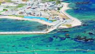 This aerial view shows land reclamation work on the Henoko coastal district of Nago, Okinawa prefecture, on December 14, 2018, to build a new site for relocating a US military airbase.  AFP / Jiji Press