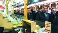 French Interior Minister Christophe Castaner (2ndR) looks on during the reopening of the christmas market of Strasbourg, eastern France, on December 14, 2018, AFP / Sebastien Bozon
