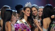 Miss Philippines Catriona Gray reacts after being crowned Miss Universe during the final round of the Miss Universe pageant in Bangkok, Thailand, December 17, 2018. REUTERS/Athit Perawongmetha 