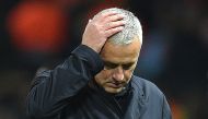 In this file photo taken on November 27, 2018 Manchester United's Portuguese manager Jose Mourinho leaves the pitch following the UEFA Champions League group H football match between Manchester United and Young Boys at Old Trafford in Manchester, north-we